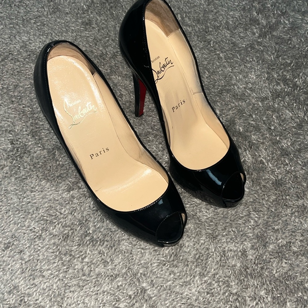 Christian louboutin patent leather pumps